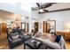 Open-concept living area filled with natural light, stylish furniture, and hardwood floors at 6526 N 13Th Dr, Phoenix, AZ 85013