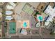 Aerial view of the community amenities including pools, tennis courts, and parking at 701 S Dobson Rd # 259, Mesa, AZ 85202