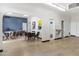 Community room with ample seating, water fountain, and painted blue accent wall at 701 S Dobson Rd # 259, Mesa, AZ 85202
