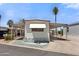 Well-maintained mobile home with a covered parking area and neat, low-maintenance yard at 701 S Dobson Rd # 259, Mesa, AZ 85202