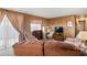 Inviting living room features wood paneling, comfortable seating and a sliding glass door at 701 S Dobson Rd # 259, Mesa, AZ 85202