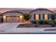Charming single-story home with a well-manicured front yard and a cozy, inviting entrance with ample parking space at 7234 S 28Th Ln, Phoenix, AZ 85041