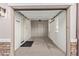 Clean and organized garage with built-in shelving units, maximizing storage and usability at 7234 S 28Th Ln, Phoenix, AZ 85041