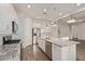 Well-equipped kitchen with granite countertops, stainless steel appliances, and ample cabinet space at 7234 S 28Th Ln, Phoenix, AZ 85041