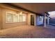 Large covered patio features brick flooring and ample space for outdoor dining and entertaining at 7234 S 28Th Ln, Phoenix, AZ 85041