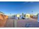 Spacious backyard with desert landscaping, covered patio, and privacy fencing at 7318 E Arbor Ave, Mesa, AZ 85208