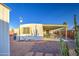 Backyard featuring a covered patio, desert landscaping, and low-maintenance gravel at 7318 E Arbor Ave, Mesa, AZ 85208