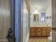 Bathroom featuring updated vanity and shower-tub combination at 7318 E Arbor Ave, Mesa, AZ 85208