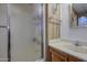 Bathroom featuring updated vanity with natural light and a shower at 7318 E Arbor Ave, Mesa, AZ 85208