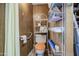 Small bathroom featuring a toilet, shelving, and a shower behind a curtain at 7318 E Arbor Ave, Mesa, AZ 85208