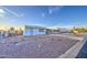Nice single-story home showcasing the low maintenance desert landscaping at 7318 E Arbor Ave, Mesa, AZ 85208