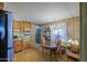 Cozy kitchen featuring lots of storage and a dining area at 7318 E Arbor Ave, Mesa, AZ 85208