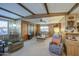 Open-concept living room featuring nice furniture, a ceiling fan, and carpet floors at 7318 E Arbor Ave, Mesa, AZ 85208