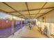 Spacious covered patio with outdoor seating, offering a relaxed living area at 7318 E Arbor Ave, Mesa, AZ 85208