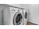 A view of the laundry room features a Samsung washer and dryer at 7778 N 51St Ln, Glendale, AZ 85301