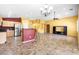 Open concept living area with tile flooring, neutral walls and natural lighting at 7778 N 51St Ln, Glendale, AZ 85301