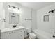 Stylish bathroom featuring white hexagon tile, updated vanity, and modern fixtures at 843 N Evergreen St, Chandler, AZ 85225