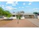 Charming single-story home with well-maintained front yard and covered carport at 843 N Evergreen St, Chandler, AZ 85225