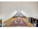 Expansive finished attic space with hardwood floors, ideal for a playroom or creative studio at 87 W Windsor Ave, Phoenix, AZ 85003