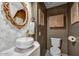 Chic powder room with decorative mirror, stylish sink, and modern toilet at 87 W Windsor Ave, Phoenix, AZ 85003
