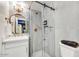 Modern bathroom with glass shower, floating vanity, and stylish fixtures at 87 W Windsor Ave, Phoenix, AZ 85003