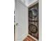 Convenient laundry closet with a stacked washer and dryer unit at 87 W Windsor Ave, Phoenix, AZ 85003