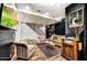 Cozy living room features hardwood floors, a vintage radio, and comfortable seating at 87 W Windsor Ave, Phoenix, AZ 85003