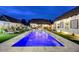 Backyard pool with fountains and lounge chairs, perfect for relaxation and outdoor entertaining at 87 W Windsor Ave, Phoenix, AZ 85003
