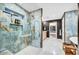 Stunning primary bath with luxury walk-in shower, marble tile, and refined finishes at 87 W Windsor Ave, Phoenix, AZ 85003