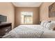 Bright bedroom with a large window and modern decor at 900 S 94Th St # 1166, Chandler, AZ 85224