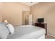 A cozy bedroom featuring a TV and neutral-toned walls at 900 S 94Th St # 1166, Chandler, AZ 85224