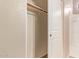 An organized closet with a built-in rack and a sliding door at 900 S 94Th St # 1166, Chandler, AZ 85224