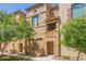 Desirable townhouses with private balconies, charming architectural details, and lush green lawns at 900 S 94Th St # 1166, Chandler, AZ 85224