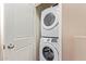 Convenient laundry area featuring a stacked washer and dryer at 900 S 94Th St # 1166, Chandler, AZ 85224