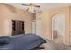 Well lit bedroom featuring a large closet and ensuite bathroom at 9309 E Obispo Ave, Mesa, AZ 85212