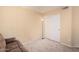 Bedroom with a carpet floor, a closet, and natural light at 9309 E Obispo Ave, Mesa, AZ 85212