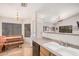 Bright kitchen featuring a breakfast nook, granite countertops, and stainless steel appliances at 9309 E Obispo Ave, Mesa, AZ 85212