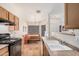 Bright kitchen and nook area, providing a cozy space for casual dining at 9309 E Obispo Ave, Mesa, AZ 85212