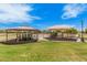 Neighborhood park with shaded playground equipment and green space for outdoor activities at 9309 E Obispo Ave, Mesa, AZ 85212