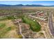 Aerial view of golf course community with a red marker on the home location at 9566 E Raindance Trl, Scottsdale, AZ 85262