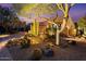 Inviting front yard landscaping with desert plants and decorative lighting at 9566 E Raindance Trl, Scottsdale, AZ 85262