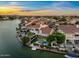 Beautiful waterfront home featuring a private pool, patio, and access to a picturesque lake community at 1700 E Lakeside Dr # 12, Gilbert, AZ 85234