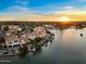 Desert community featuring waterfront homes with private boat docks, pools, and picturesque desert sunsets at 1700 E Lakeside Dr # 12, Gilbert, AZ 85234