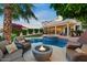 Backyard has a pool, spa and outdoor seating at 1700 E Lakeside Dr # 12, Gilbert, AZ 85234