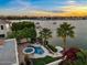 Desert waterfront home with a patio, pool, jacuzzi, boat dock, and manicured landscaping at 1700 E Lakeside Dr # 12, Gilbert, AZ 85234