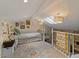Cozy bedroom with a skylight, decorative rug, and unique wall decor at 1700 E Lakeside Dr # 12, Gilbert, AZ 85234
