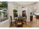 Cozy breakfast nook with views of manicured landscaping and backyard at 1700 E Lakeside Dr # 12, Gilbert, AZ 85234