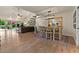 Inviting dining area with wood floors, spiral staircase, and natural light at 1700 E Lakeside Dr # 12, Gilbert, AZ 85234