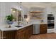 Stylish, updated kitchen features stainless appliances and plenty of counter space at 1700 E Lakeside Dr # 12, Gilbert, AZ 85234