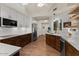 Bright, updated kitchen with stainless appliances, wood floors and breakfast bar at 1700 E Lakeside Dr # 12, Gilbert, AZ 85234